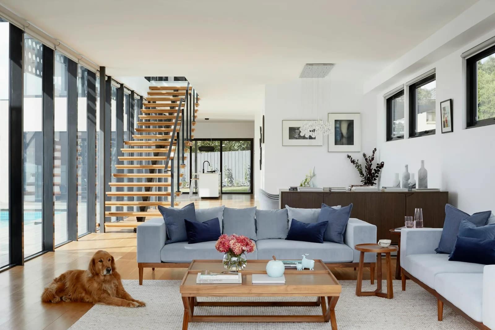 Interior with a textured accent wall and rich timber shelving